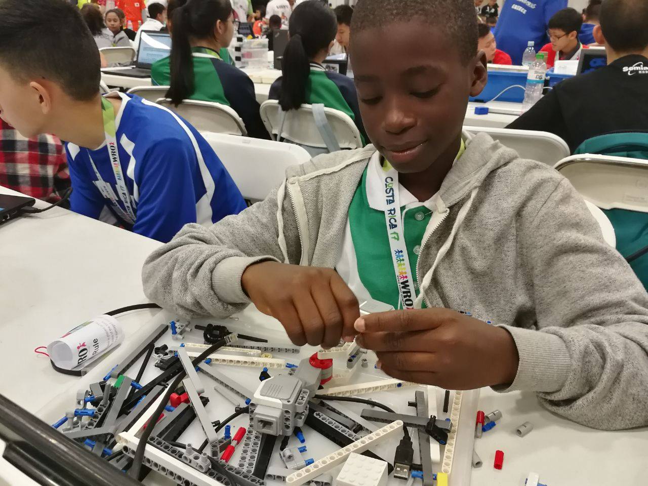 Teams assembling their robot for competition